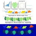 Fluorescent dinosaur and leaf party banner set with dimensions and neon glow effect - Dinosaur Leaf Banner