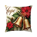 Detail of Christmas pillow cover with golden bells, poinsettia and Hope lettering - Hope and Floral Pattern