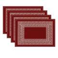Close-up of four red bohemian placemats with white Greek key patterns and stitched edges - Maroon with White Greek Key (Style 8)