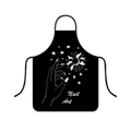 Detail of black waterproof apron with white Nail Art print and celestial motifs - Nail Art Hand Lines