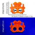 Maschera triceratopo in feltro arancione per festa dinosauri con effetto fluorescente UV - Stile Ankylosaurus