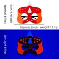 Occhiali dinosauro neon per feste bimbi con montatura rossa ed effetto fluorescente UV - Stile Triceratopo