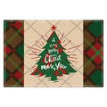 Close-up of Christmas placemat featuring red and green plaid with a festive tree pattern - Christmas Tree Style