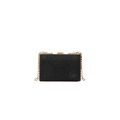 Elegante schwarze Abendtasche mit Glitzer-Finish, Goldrahmen und feiner Kette - Schwarz
