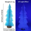 Blue mini Christmas tree with wooden base featuring fluorescent UV light effect - 30cm Fluorescent Blue Tower Tree