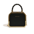 Elegant black and gold octagonal handbag with leather texture and chain strap - Black