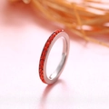 Polished titanium steel ring featuring a full circle of channel-set red zircon stones - November Birthstone