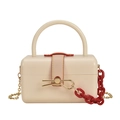 Cream acrylic box bag with gold lock and contrasting red chain strap for women - Milky White