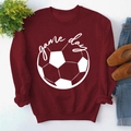 Flat lay of burgundy Game Day sweatshirt with football print, jeans, and shoes - S / Wine Red (White Font)