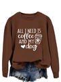 Close-up of All I Need is Coffee and My Dog print on brown loose crewneck sweatshirt - Coffee (White Font)
