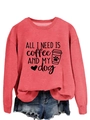 Detail of pink crewneck sweatshirt featuring All I Need Is Coffee and My Dog print - Red (Black Font)