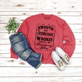 Flat lay of red crewneck sweatshirt with Tennessee Whiskey text print and jeans - Red (Black Font)