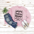 Flat lay of pink Tennessee whiskey graphic sweatshirt with casual lifestyle styling - S / Pink (Black Text)