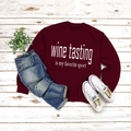 Flat lay of red round neck sweatshirt with Wine Tasting print and casual ripped jeans - S / Wine Red (White Font)