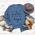 Close-up of blue crewneck sweatshirt with Life Is Better With My Boys print and autumn decor - S / Blue (Black Font)