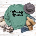 Flat lay of light green Whiskey Weather sweatshirt with autumn accessories on wood background - S / Light Green Sweatshirt (Black Font)