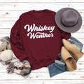 Flat lay of burgundy Whiskey Weather sweatshirt with autumn accessories on white wood - S / Wine Red Sweatshirt (White Font)