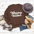 Flat lay of brown Whiskey Weather sweatshirt with autumn accessories on wood background - S / Coffee Sweatshirt (White Font)