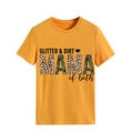 Detailed close-up of the Glitter and Dirt Mama of both leopard print text on mustard yellow tee - S / Mustard Yellow