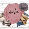 Flat lay of pink Auntie sweatshirt styled with autumn accessories on white wood - S / Rose Gold Sweatshirt (Black Font)