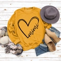 Senfgelbes Sweatshirt mit Mimi-Herzaufdruck flach liegend auf weißem Holzhintergrund - S / Gelb (Schwarzer Druck)