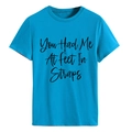 T-shirt blu pavone a girocollo con testo artistico You Had Me At Feet In Straps - Taglia S / Top / Blu lago