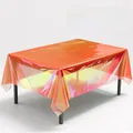Detail der schillernden PET-Tischdecke mit Laser-Effekt für Partydekorationen - 272cmx101cm / Orange