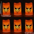 Set of 6 orange Halloween LED candles featuring black skull patterns and flickering light - Skull Style / Set of 6 / Orange