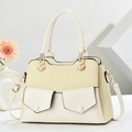 Chic beige textured tote bag with woven paneling and shell-shaped metal accents - Off White