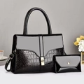 Black crocodile-pattern patent leather tote set with gold twist lock and shoulder strap - Black