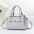Light gray lychee leather handbag with silver hardware and adjustable shoulder strap - Gray