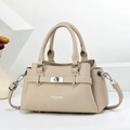 Elegant beige lychee grain leather handbag with silver turn-lock and detachable strap - Khaki