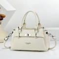 Detail of cream white leather handbag featuring silver hardware and fashion text engraving - Off White