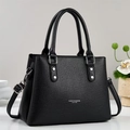 Fashion black lychee leather handbag with silver hardware and adjustable shoulder strap - Black
