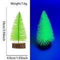 Miniature 10cm green fluorescent Christmas tree with natural wood base and UV glow effect - 10CM Fluorescent Green Tree