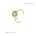 Anillo ajustable de acero dorado con circón azul cuadrado y detalles pavé - Anillo de Circonita Azul