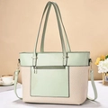 Detail of light green leather and beige woven tote bag with adjustable shoulder straps - Green