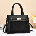 Chic black leather handbag with gold metal clasp and adjustable strap for daily commute - Black