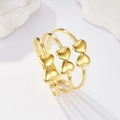 Detailed view of triple-layered gold heart cuff bracelet with polished mirror finish - Gold Heart (LB1011)