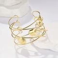Golden wide open cuff bracelet with sea stars shells and pearls on white stone base - Gold Shell (LB1064)