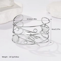 Dettaglio del bracciale a polsino argento con ciondoli a stella marina e perle - Conchiglia Argento (LB1064)
