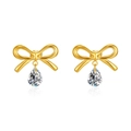 Elegantes pendientes de lazo dorado con circonitas de pera y acabado metálico pulido - Pendientes de oro