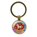 Llavero del año del caballo 2026 en bronce con un colgante de caballo rojo - Patrón Corcel Blanco Fondo Rojo (Bronze-1)