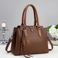 Deep brown lychee textured tote bag with silver V-hardware and round top handles - Coffee