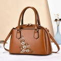 Vintage brown tote bag with floral embroidery and dual handles for a stylish look - Earthy Yellow