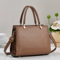 Brown leather handbag with embossed patterns, dual handles and adjustable shoulder strap - Khaki
