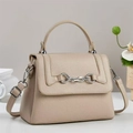 Minimalist beige lychee grain crossbody bag with silver horsebit detail and top handle - Khaki