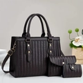 Detailed view of dark brown woven three-piece bag set with gold hardware accents - Coffee