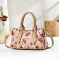 Stylish beige crossbody bag featuring sweet red cherry patterns and gold-tone hardware - Light Khaki