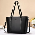 Borsa tote in pelle nera con barra metallica argentata e tracolla regolabile - Nero